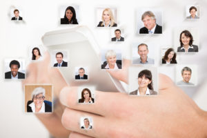 Collage of business people with hands using cell phone representing on demand service